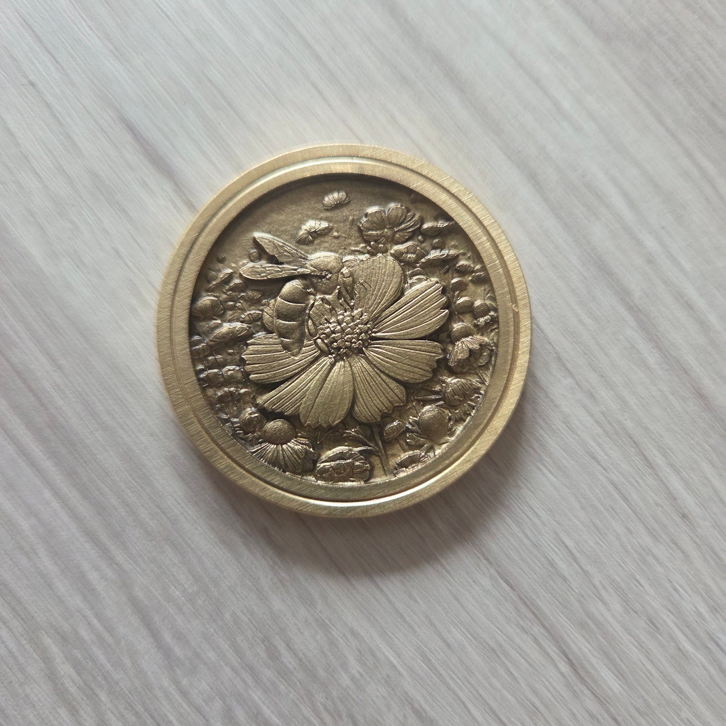 3 Brass Coins Carved with a Bee on a Flower