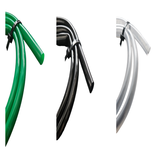 Three PVC tubes in different colors: green, black, and clear, displayed side by side against a white background.