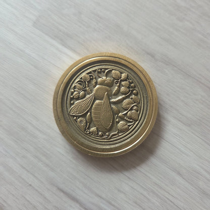 3 Brass Coins Carved with a Bee on a Flower